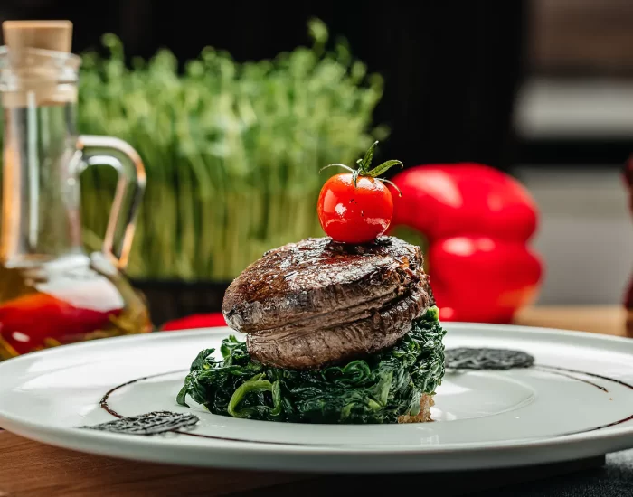 delicious-beef-medallions-served-with-spinach